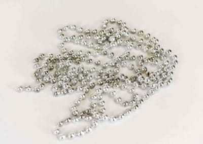 vuokrasomiste, annenpartydeco, somiste, vuokratuote, vuokrattavat juhlatarvikkeet, helminauha, hopea